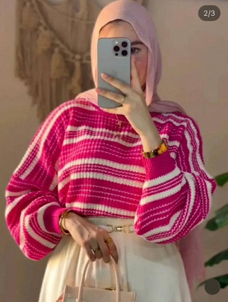 بلوزة تريكو مقلمة